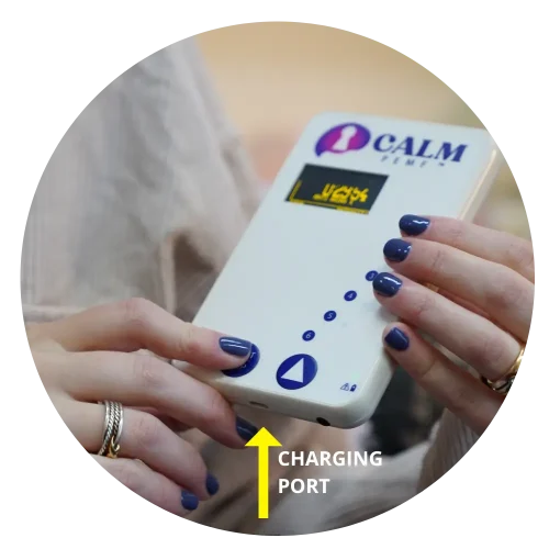 CALM PEMF device charging port labeled in circular detail photo
