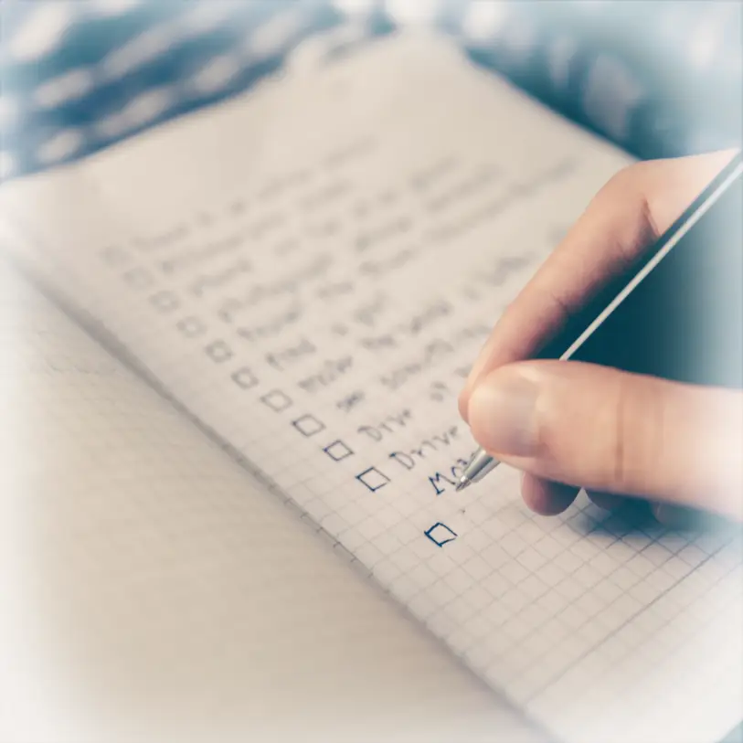 Child pointing at health and task checklist on paper