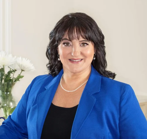 Dr. Roseann Capanna-Hodge in blue blazer, professional headshot