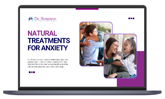 Laptop mockup showing Natural Treatments for Anxiety with family photos
