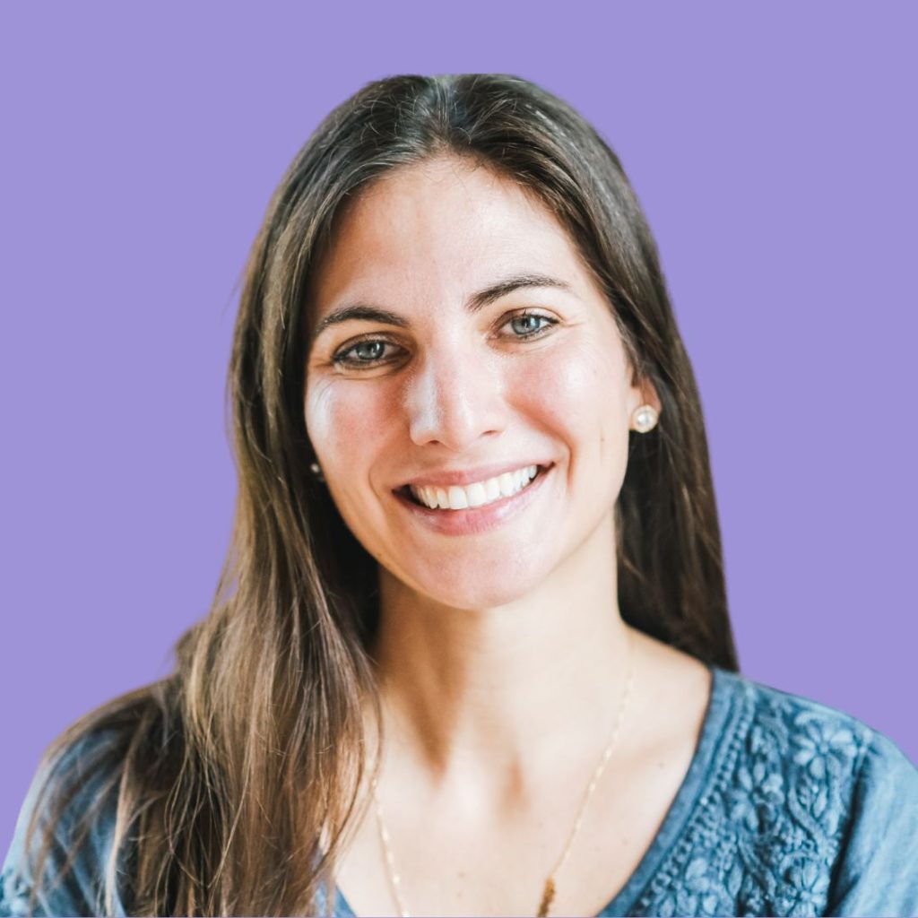 Woman professional headshot against purple background