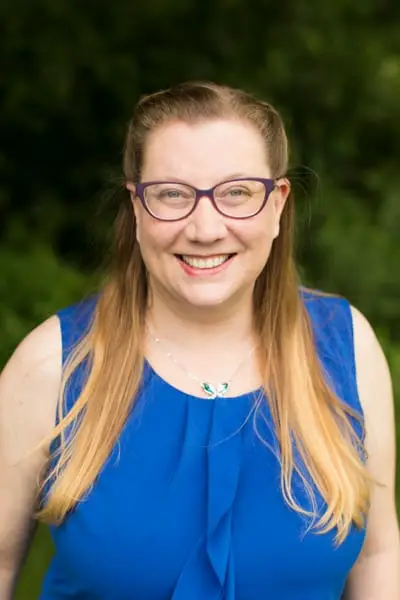 Professional headshot of therapist Michele outdoors