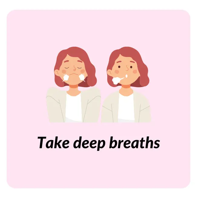 Person with hands to face demonstrating deep breathing